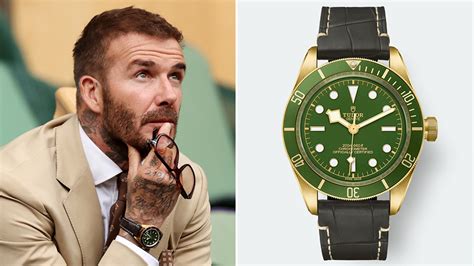 David Beckham Rocks a Gold and Green Tudor Dive .